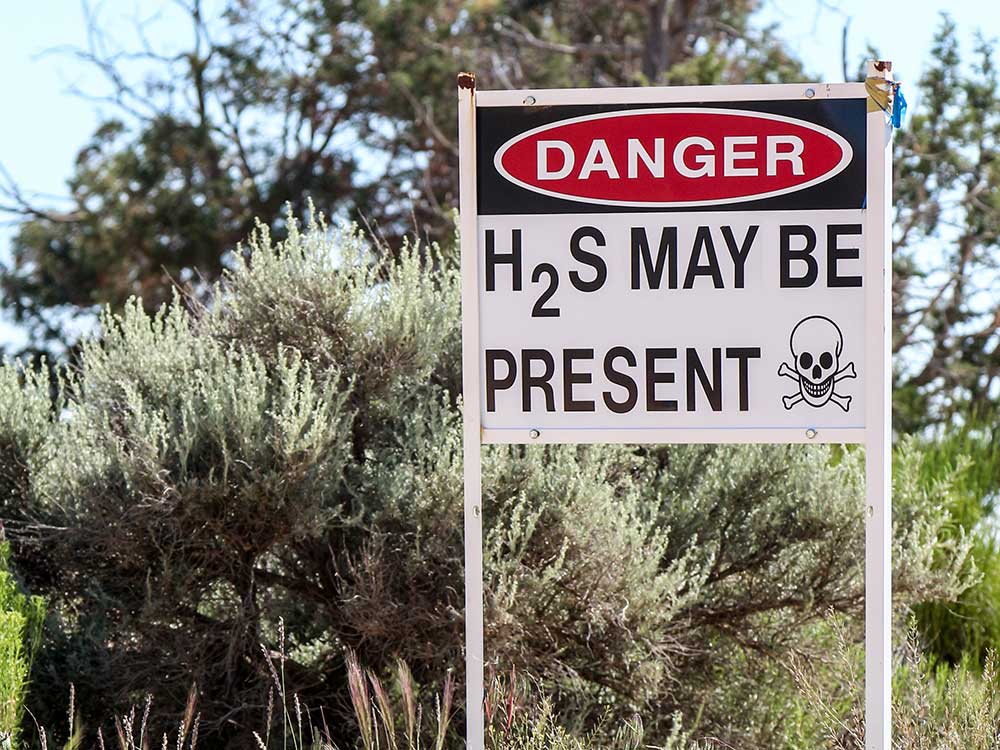 Danger sign with message, "H2S may be present"