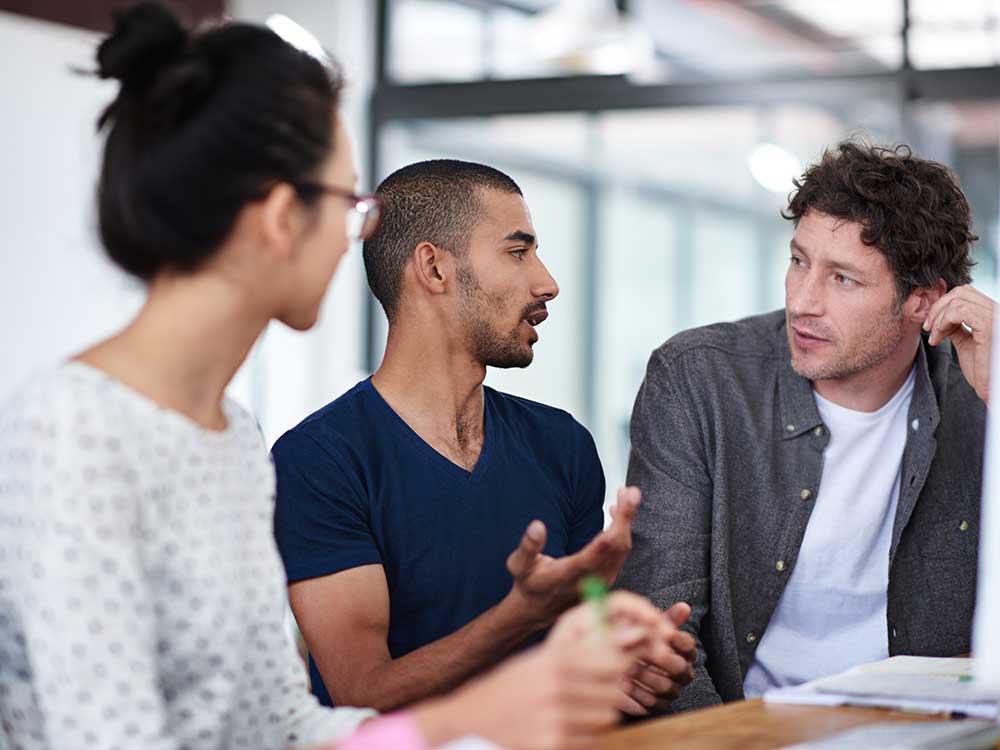 Group of people talking to each other
